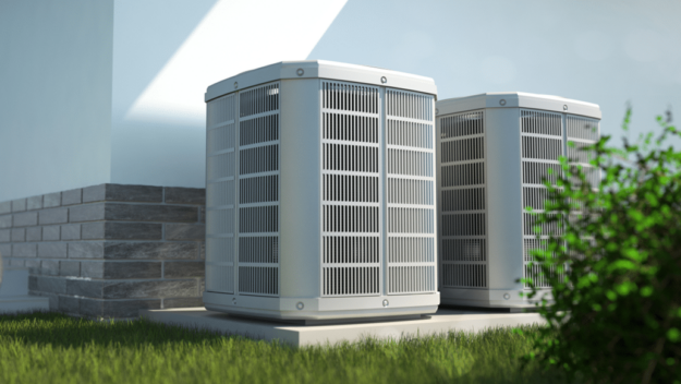 2 AC units next to each other outside house