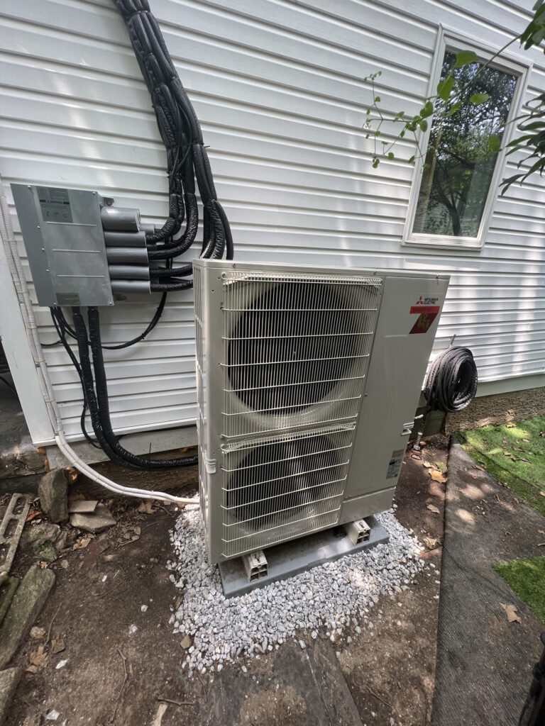 Unit outside of house on fresh pile of gravel